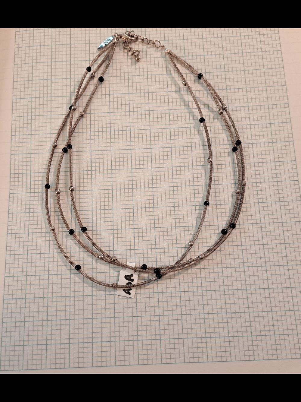 New York & Company Silver Guitar Wire Multi-Strand Necklace with Black Beads - Picture 4 of 5